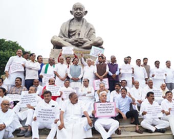 Cong protests, slams ED bid to pressurise officer to name Karnataka CM, Dy CM in tribal Board case