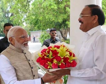 PM Modi celebrates Venkaiah Naidu on his 75th birthday